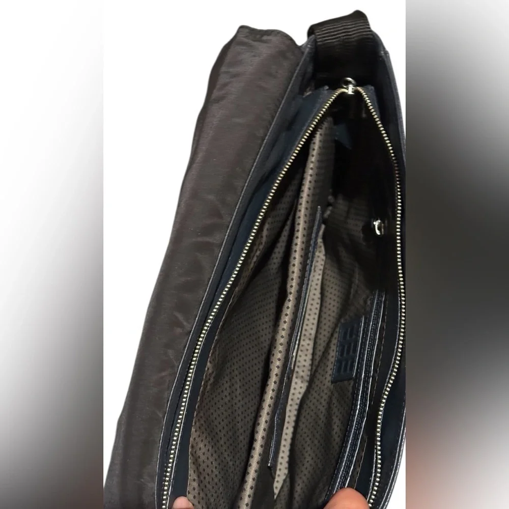 Moleskine Black Leather Laptop Bag w/ adj. waist strap.